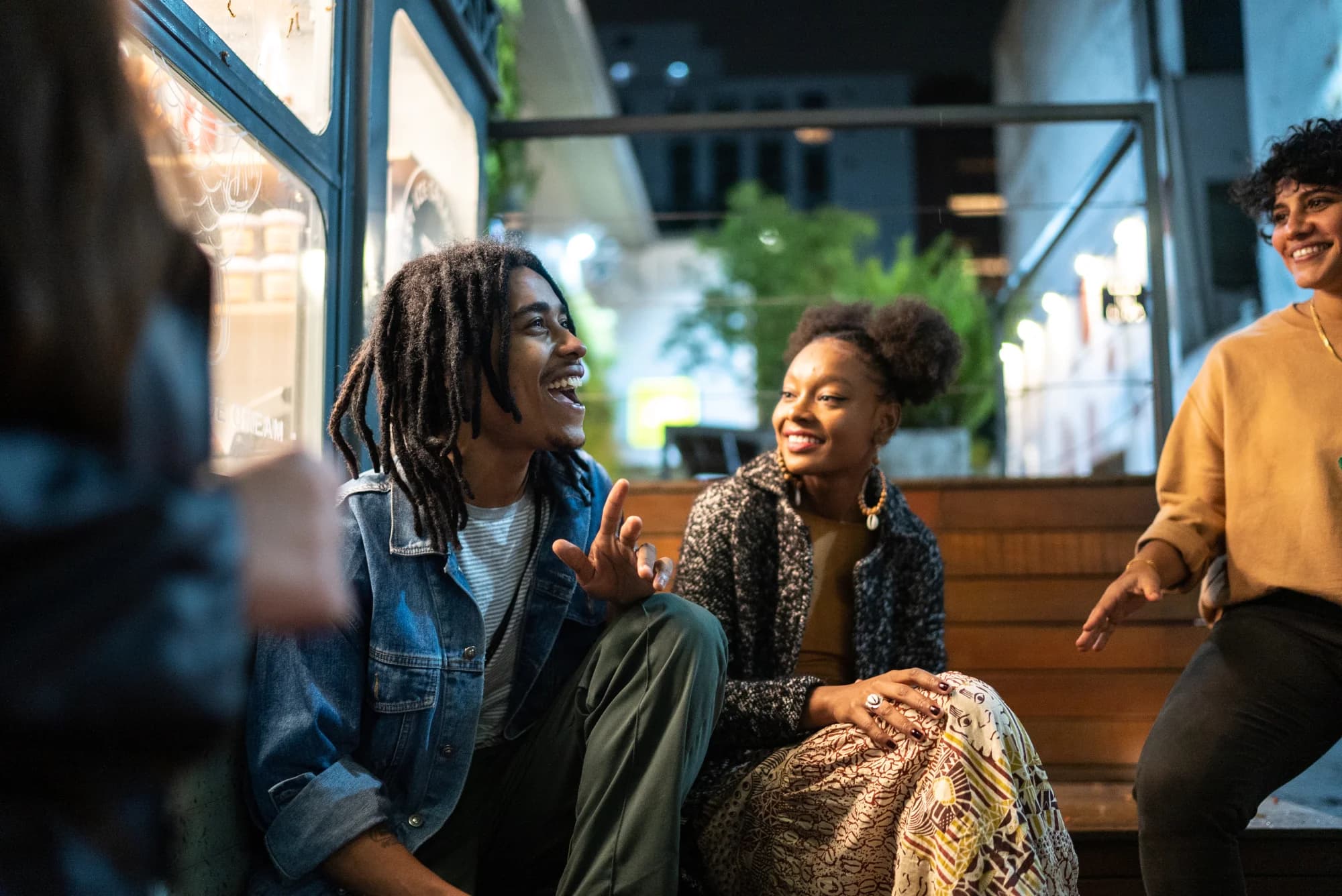 Friends laughing together on a night out